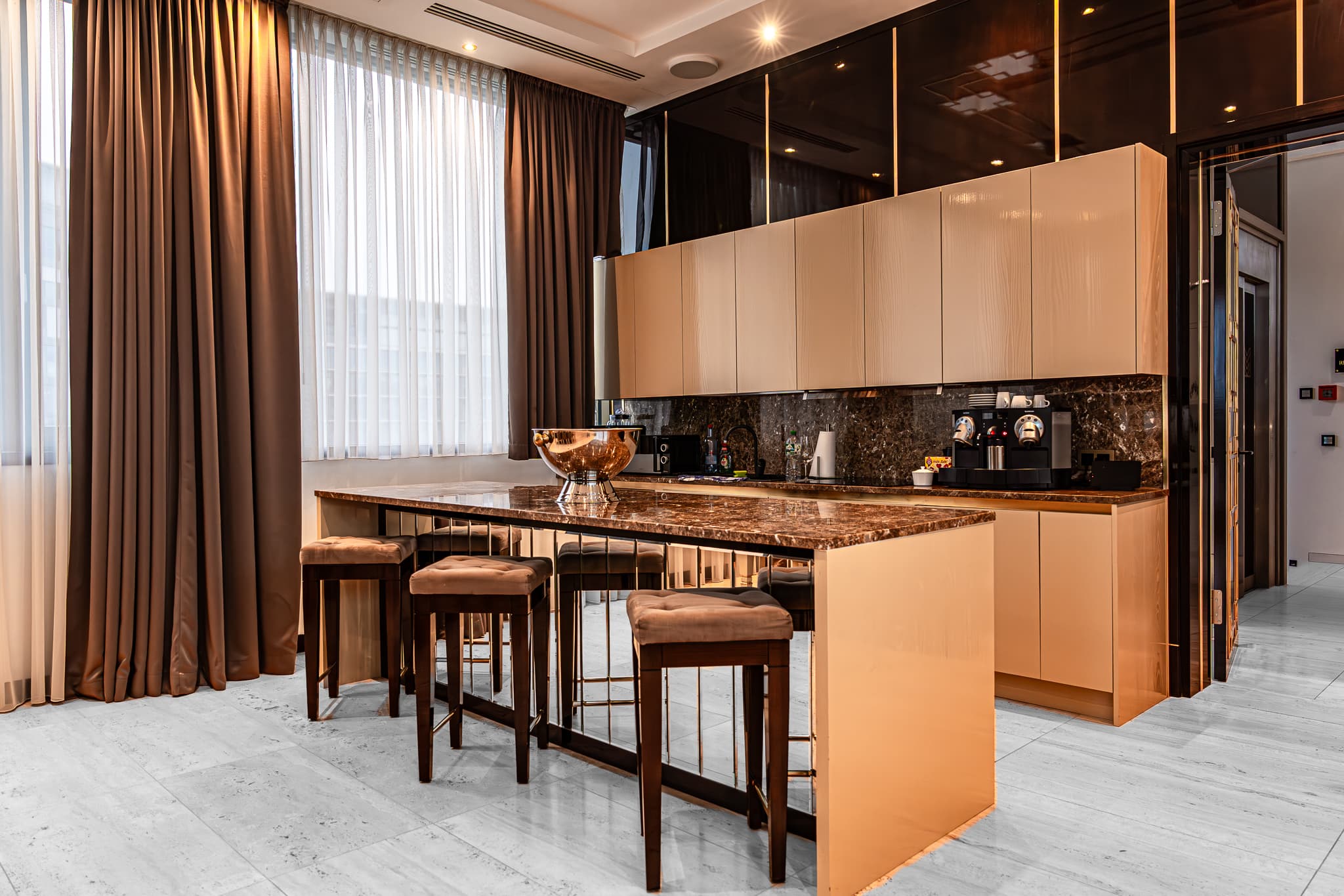 Living-and-dining area of Main Suites Hotel - Image 1